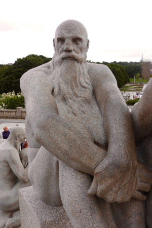 Granite statue of bearded older man