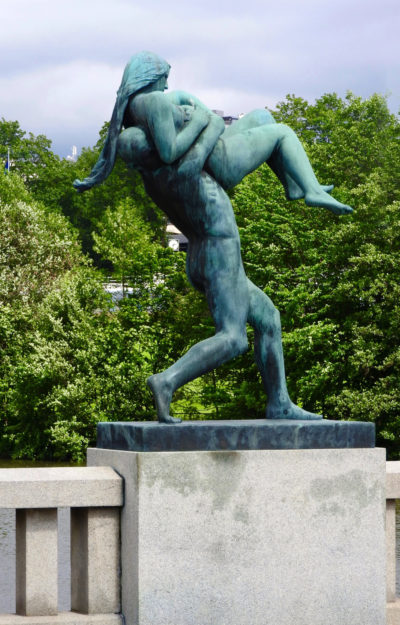 Bronze sculpture of a naked man lifting and about to throw a naked woman