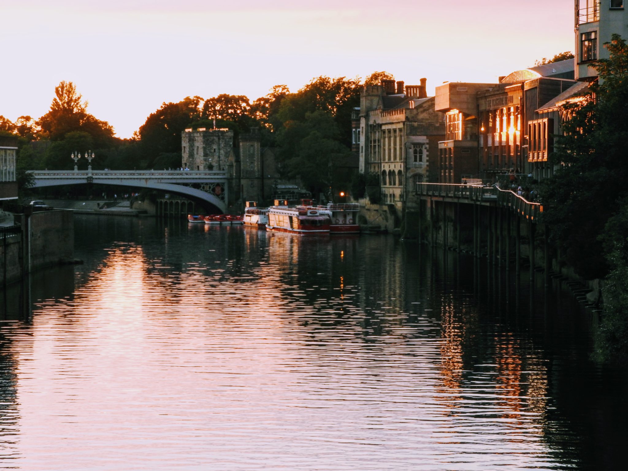 Sunset over the River Ouse in Yorkshire, seen from a bridge in the city of York.