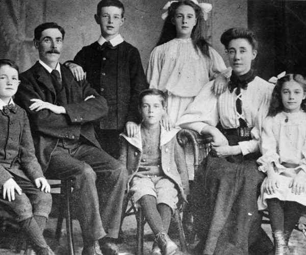 B&W photo of parents and five children