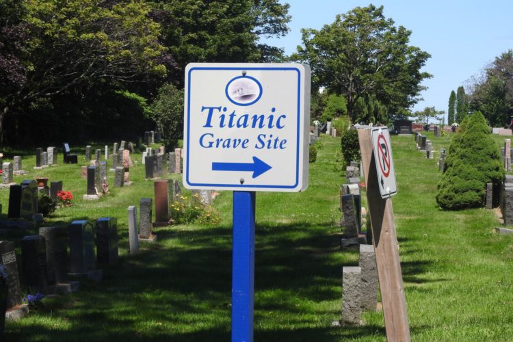 Blue & White Sign Indicating Direction To The Titanic Grave Site